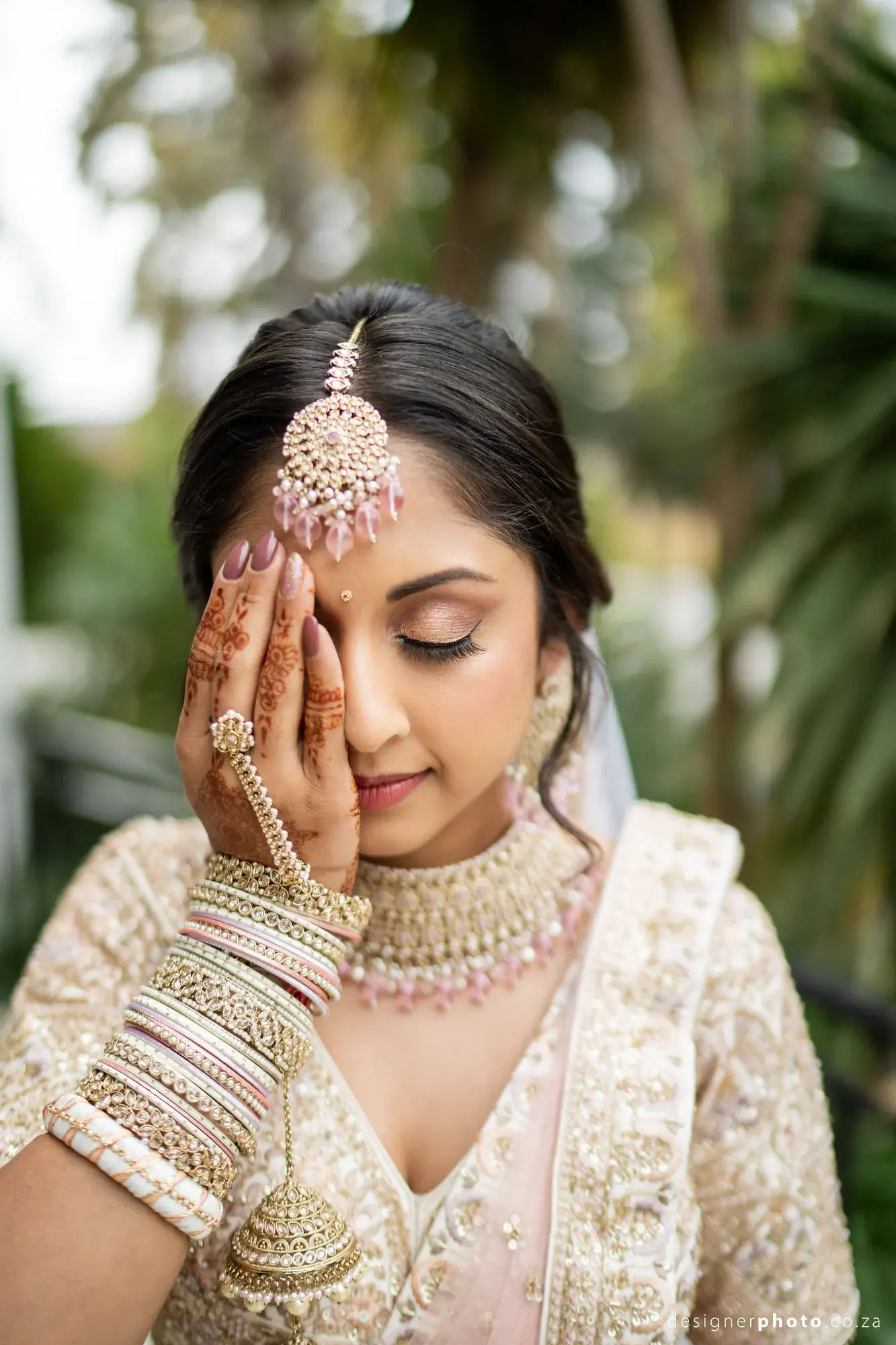Gujarati bride with traditional henna