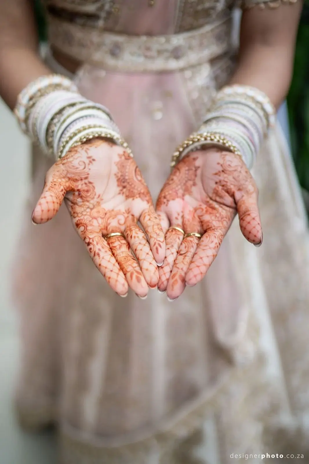 Delicate bridal henna on hands